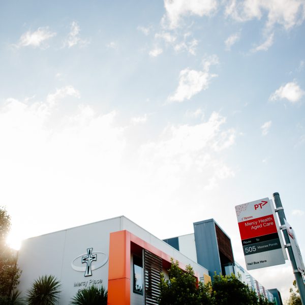 Mercy Place Parkville exterior with bus stop in the foreground